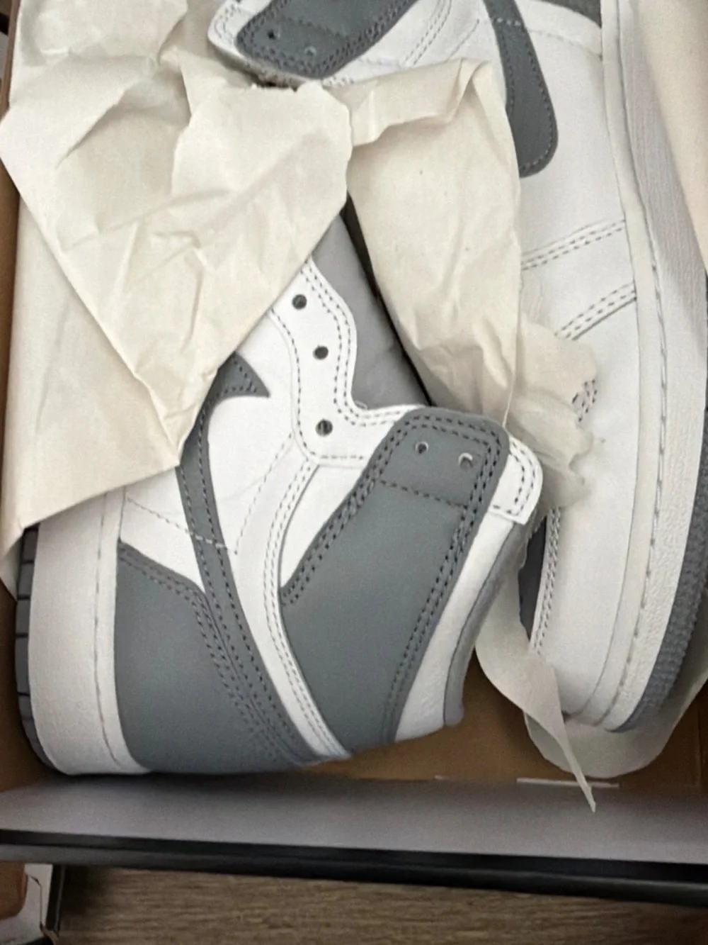 Air Jordan 1 Retro High OG “Stealth” (GS) sneakers.